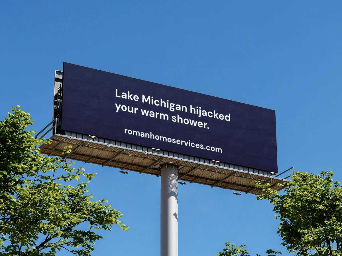 Billboard reading "Lake Michigan hijacked my warm shower."